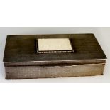 A French Art Deco silver rectangular box, textured lid and body with rope twist edges,