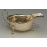 A silver gravy boat of conventional form, by Viner's Ltd, Sheffield 1937, 7.