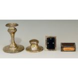 A collection of items to include: a small silver capstan inkwell, Birmingham 1912, 4cm high, 6.