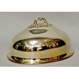 A silver plated oval meat dome with foliate cast handle,