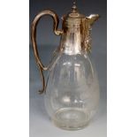 A Victorian silver mounted claret jug, the glass body engraved with a fox in the countryside,