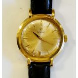 An 18ct yellow gold ladies wristwatch, the dial with bar numerals inscribed Omega, Omega crown,