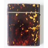 A tortoiseshell card case of rectangular form,