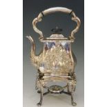 A silver plated bachelor's spirit kettle on stand, the body scrolling foliate engraved,