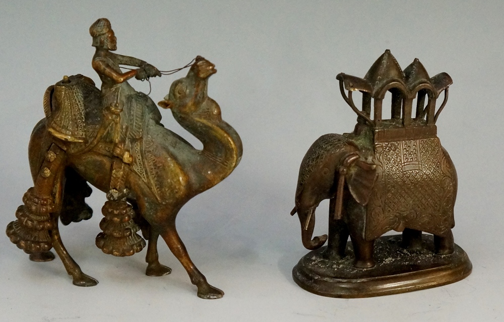 A bronze model of an Indian elephant with a howdah on its back,