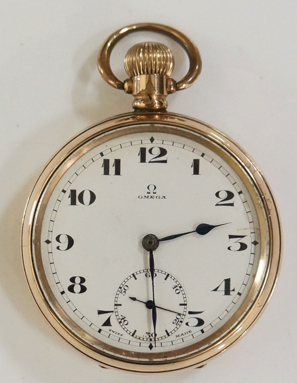 An Omega gold plated pocket watch, top wind, the white enamel face with subsidiary seconds dial,