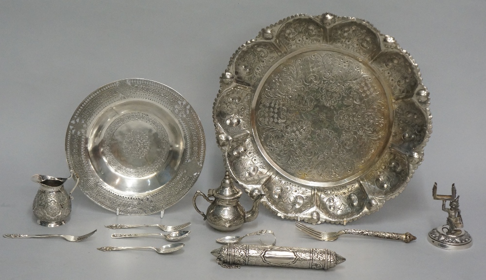 A quantity of silver coloured metal items to include: a scroll case,