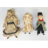 A collection of three late 19th / early 20th Century porcelain headed miniature dolls,