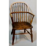 A 19th Century ash and elm Windsor elbow chair with saddle seat on turned legs joined by an H
