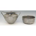 An Art Nouveau four handled textured vasular bowl or vase,