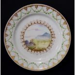 Pinxton - a rare circular tea plate painted to the centre with a mountainous and wooded landscape