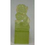 A Chinese jadeite hardstone seal, the square tablet with kylin finial, 6cm high,