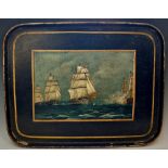 A Victorian rounded rectangular black papier maché tray painted to the centre with galleons at war