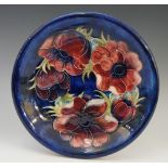 Moorcroft - an anemone pattern circular dish, 21.