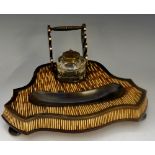 A mid 19th Century porcupine quill and horn inkstand of shield shape,