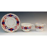 Pinxton - a pattern number 343 trio (unfinished), the Imari style pattern within gilt line rims,