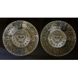 A pair of clear pressed glass dishes,