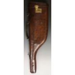 A 19th Century 'leg-o-mutton' brown leather gun case with brass lock and fittings,