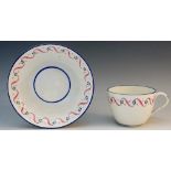 Pinxton - a pattern number 22 cup and saucer decorated with red foliate trail,