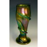 A large Art Nouveau Loetz waisted and dimpled glass vase, in tones of iridised green and purple,