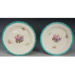 Pinxton - a pair of William Billingsley decorated shaped circular plates with fluted borders,