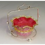 A cranberry glass sweetmeat dish overlaid with white crackle glass,