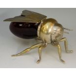 A silver plated honey pot in the form of a bee,