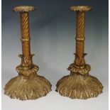 A pair of William IV brass table candlesticks,