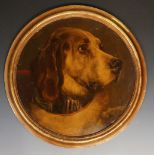 A pair of late 19th Century continental oleographic prints of dogs heads, 44cm diameter,