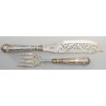 A pair of Victorian silver pierced and foliate engraved fish servers,