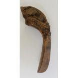 Treen - an interesting shoe horn with carved zoomorphic handle,