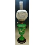 A Victorian opaque green glass oil lamp,