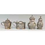 A selection of silver items to include: a pepperette, half lobed body, acorn finial,