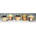 Five Beswick character teapots: Peggitty (2), Dolly Varden (2), and Sam Weller,