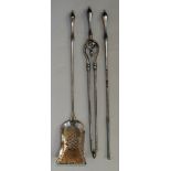 A set of three late 18th / early 19th Century polished steel fire irons comprising shovel,