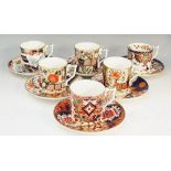 A set of six Royal Crown Derby "The Curator's Collection" coffee cans and saucers: Derby Garden,