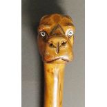 A 19th Century walking stick, the rootball terminal carved as a boxer dog's head,