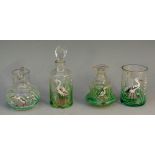 A selection of four pieces of miniature glassware comprising: a jug, a tankard,