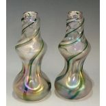 A pair of Art Nouveau Bohemian waisted and dimpled glass vases,