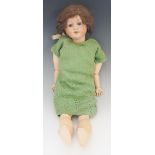 A large Herman Steiner porcelain headed doll with closing eyes,