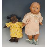 A Norah Wellings black girl doll - Jolly Joker, painted eyes and features,