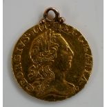 A George III gold quarter guinea, 1762,