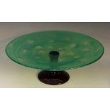 A large French Art Deco Schneider green glass tazza, with encased air bubbles, mauve striped foot,