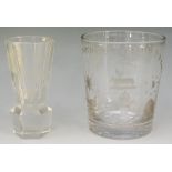 A Victorian oversized glass tumbler engraved with various symbols beneath an arch formed from the