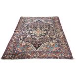 A Persian Malayer rug, central blue,