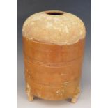 A Chinese Han period grain jar of cylindrical form, the body with brown glaze,