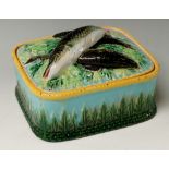 George Jones - a Victorian majolica sardine box the lid moulded with three sardines,