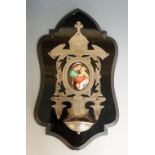 A Victorian white metal black slate and porcelain stoup the shaped plaque applied engraved white