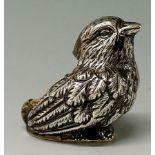 An Edwardian silver chick pin cushion of realistic form, 5cm wide, indistinct maker's mark,