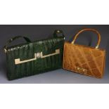 A green stained crocodile handbag with gilt metal fittings,